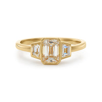 Three stone diamond ring in yellow gold