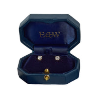 Round brilliant diamond stud earrings in yellow gold in jewellery box