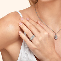 Model wearing 3.64ct Diamond Three Stone Engagement Ring with diamond pendant necklace