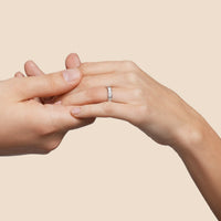 Model hand wearing Vintage Baguette 3.50ct Diamond Eternity Band in White Gold