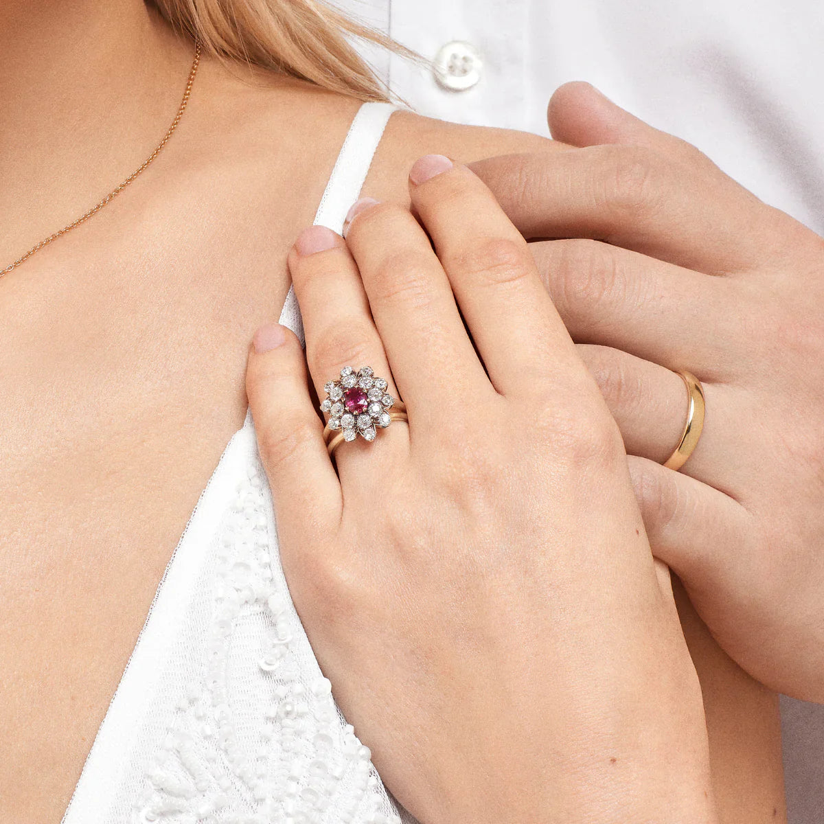 Ruby & Diamond Cluster Engagement Ring on model's hand