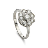 Modern 1.00ct diamond cluster engagement ring in platinum