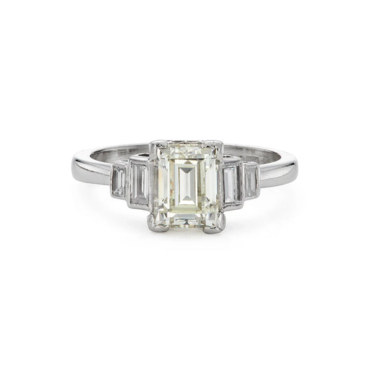 Modern emerald cut 1.40ct five stone diamond engagement ring in platinum